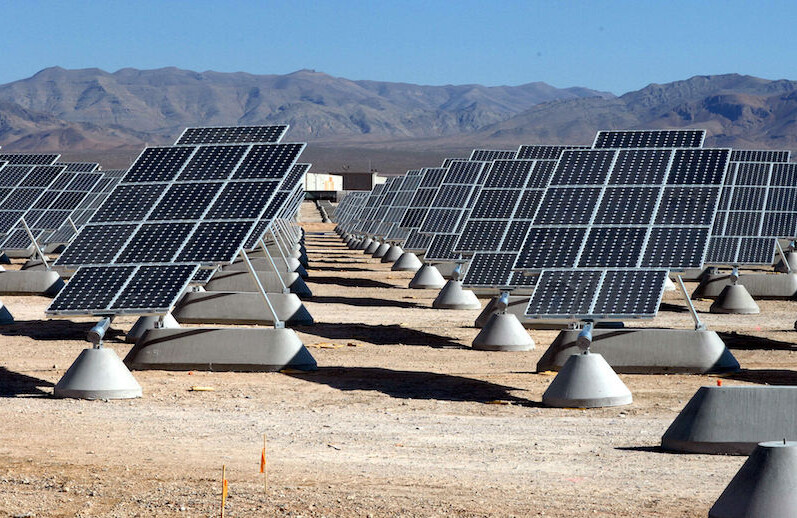 Solar array at Nellis Air Force Base, Nevada. CREDIT: <a href="https://en.wikipedia.org/wiki/Solar_power_in_the_United_States#/media/File:Nellis_AFB_Solar_panels.jpg">Larry E. Reid Jr., U.S. Air Force</a> (<a href="https://en.wikipedia.org/wiki/Copyright_status_of_work_by_the_U.S._government">CC</a>)