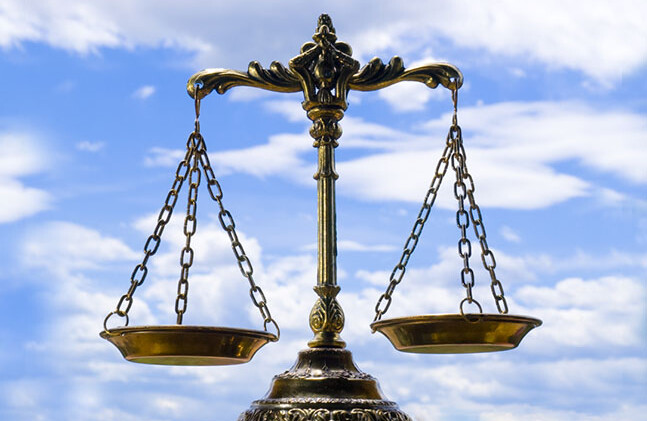 CREDIT: <a href="http://www.shutterstock.com/pic-14046070/stock-photo-a-photo-of-the-scales-of-justice-with-a-balance-theme-overlay.html" target="_blank">Shutterstock</a>