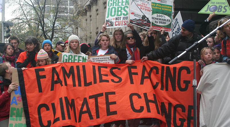 Families partake in a climate emergency protest in Melbourne, Australia. CREDIT: <A href=https://www.flickr.com/photos/takver/3622617318/>Takver (CC)</a>.